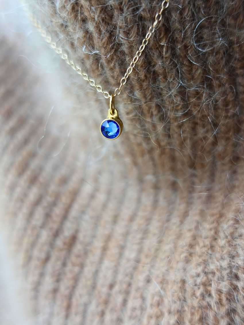 September saffier verguld